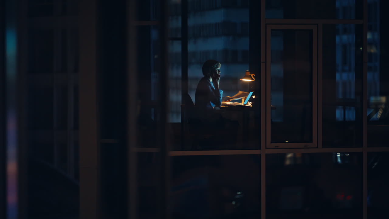 Silhouette leader speaking window view. Office employee talking mobile phone