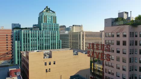 Vista-Aérea-Of-Older-Apartment-Buildings-And-Gentrified-Historic-Buildings-In-Downtown-Los-Angeles-Includes-Jesus-Saves-Sign-And-Eastern-Building-2