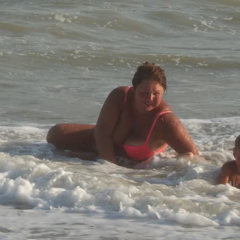 happy family of mother with kid playing