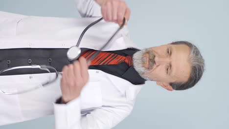 Vertical-video-of-Old-doctor-and-old-doctor's-coat.