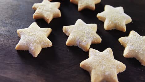 gingerbread cookies with powdered sugar sprinkled on top 4k