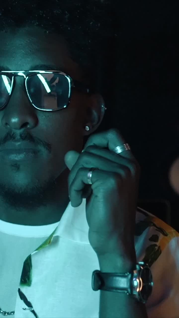 Man with Sunglasses in Studio