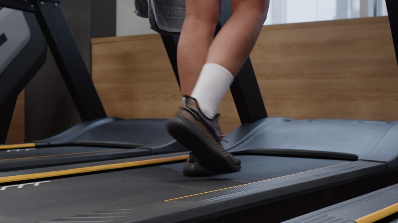 Woman Running on Treadmill