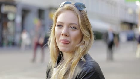 pretty smiling woman with sunglasses