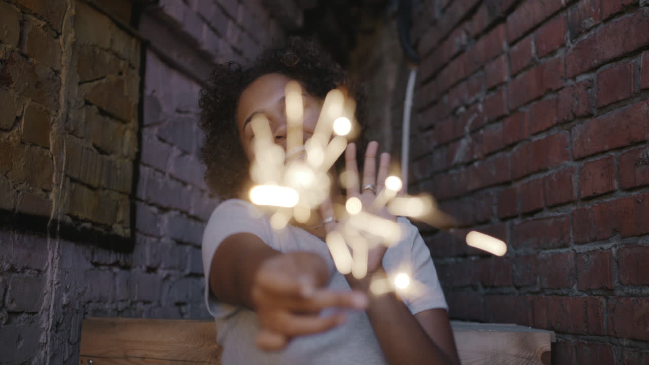 Woman Celebrating with Sparkler