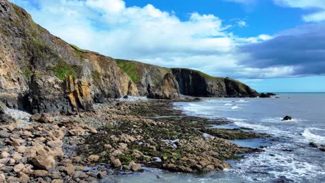 ireland sea cliffs and fragile rock formations copper coast waterford ireland at low tide