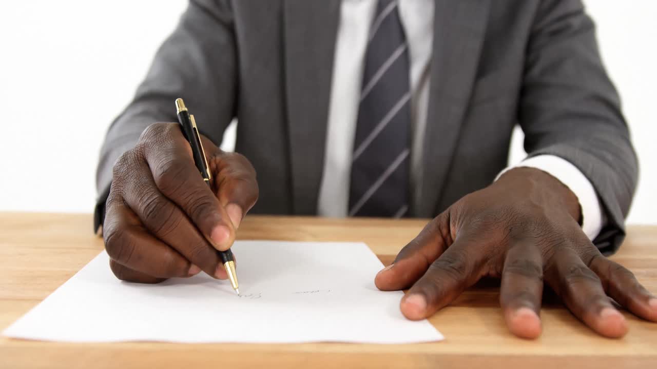 Agent sitting at desk writing an application