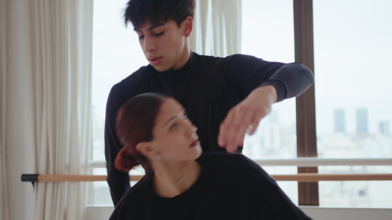 Couple Performing Modern Dance in a Rehearsal Studio