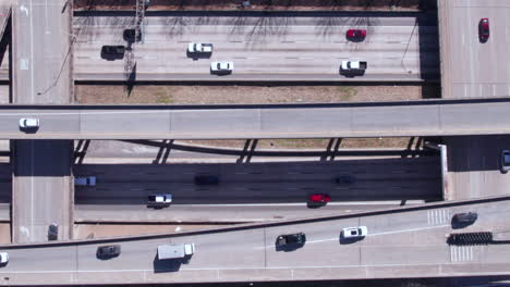 Top-Down-Aerial-View,-Traffic-on-American-Highway,-Junction-Overpass-and-Interchange,-High-Angle-Drone-Shot