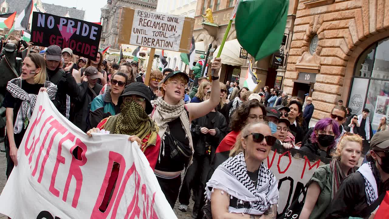 Pro Palestine protesters march against Israel’s Eurovision participation in Malmö (Sweden), calling for a ceasefire on the war in Gaza, Eurovision song contest 2024, medium handheld shot