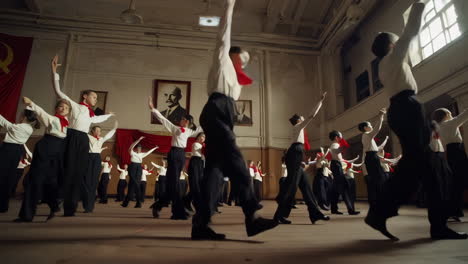 children's dance performance in a soviet-era school hall