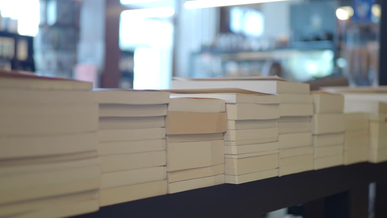 Stacks of Books on Shelves