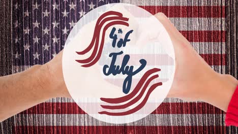 animation of 4th of july text over person making heart shape with hands over american flag