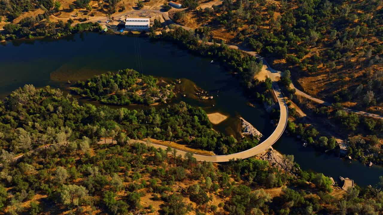 Aerial View of a Bridge Over a River and Lake