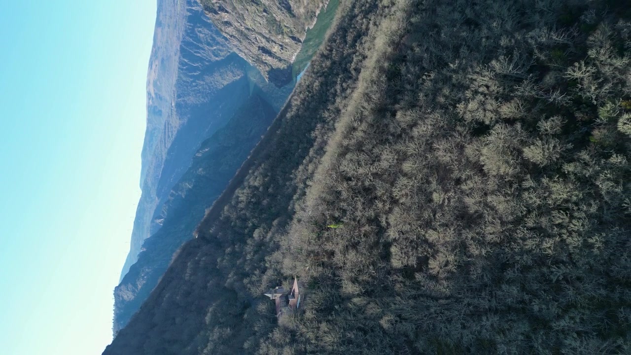 Vertical drone shot of the monastery of Santa Cristina de Ribas at the Sil Canyon in Ourense, Spain.