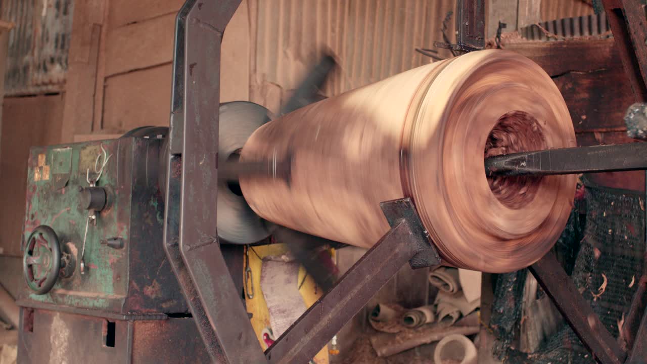usar la máquina para perforar el agujero del tambor