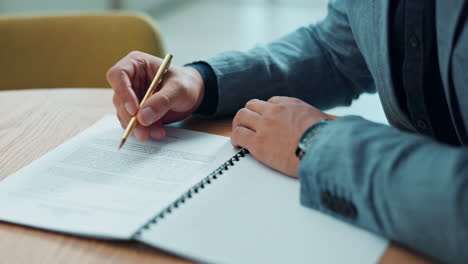 person signing a document