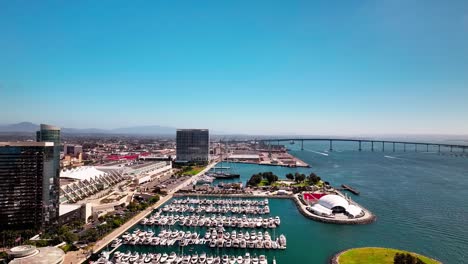 Trucking-left-aerial-view-of-the-San-Diego-Convention-Center-and-the-Rady-Shell-at-Jacobs-park