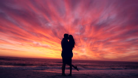 couple, silhouette with kiss at beach and sunset