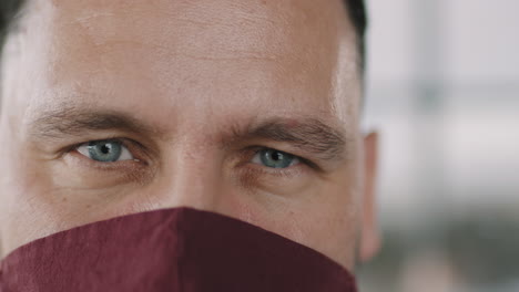 close-up of a man wearing a face mask