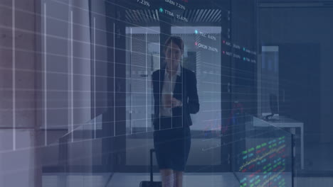 animation of data processing over smiling caucasian businesswoman with luggage in office