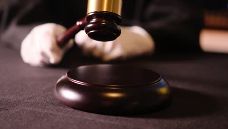 a gavel on a polished courtroom table symbolizes authority and justice, representing the rule of law