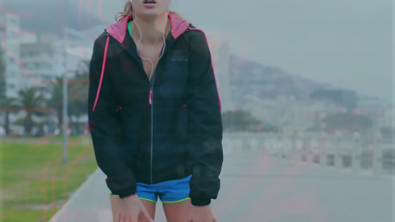 Woman jogging along waterfront promenade, with animated heart rate graph and health data overlay