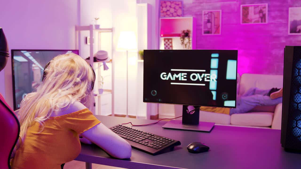 A woman is playing a videogame