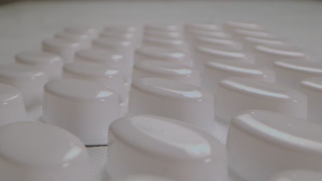 Macro-Shot-Of-Medical-Pills-White-Package,-Medicine