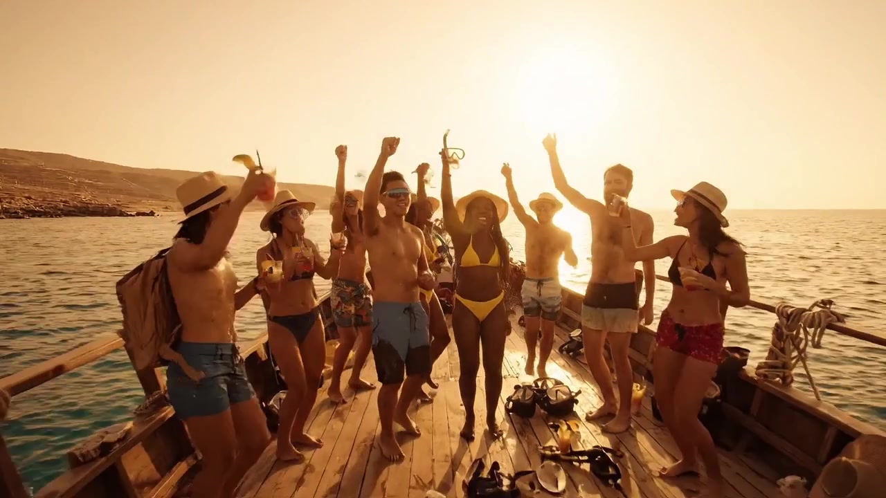Joyous Summer Celebration on a Boat as Friends Dance and Enjoy the Sunset by the Sea, Capturing the Spirit of Adventure and Togetherness in a Beautiful Setting