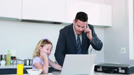 Busy-father-with-his-daughter-before-work