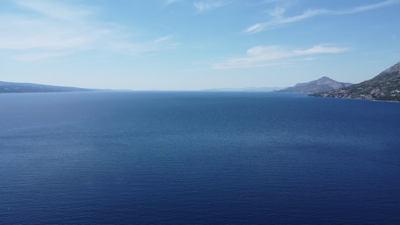 drone view over the channel of brac in the Adriatic Sea in Croatia, between makarska and omis