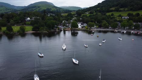 aerial view over boats docked on windermere lake at waterhead marina near ambleside, lake district