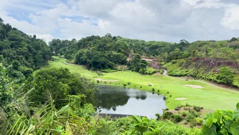 lush green golf course landscape with water in phuket thailand