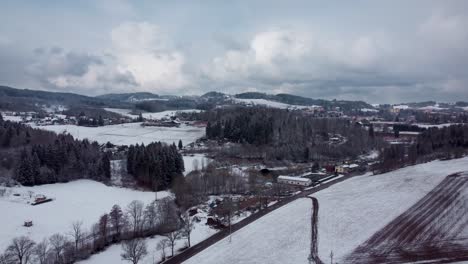 snowy-rural-landscape-of-Czechia-with-beautiful-clouds,-flying-forward