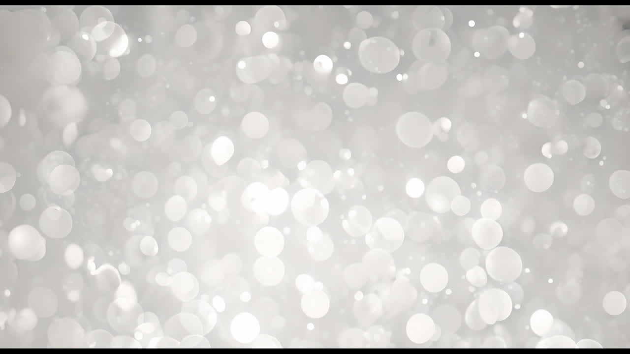Animation of white spots moving on gray background
