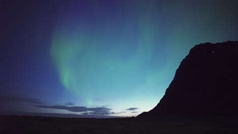 beautiful faint colors of the aurora at sunrise - wide