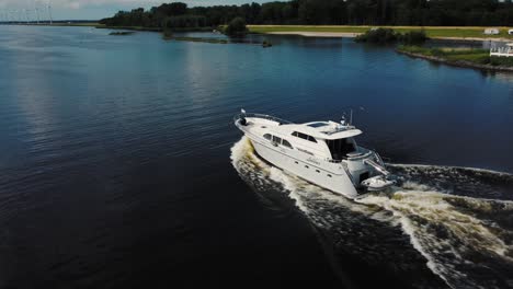 luxurious white yacht sailing on water