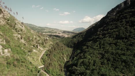 aerial forward view of street in the mountain. lavello, south of italy