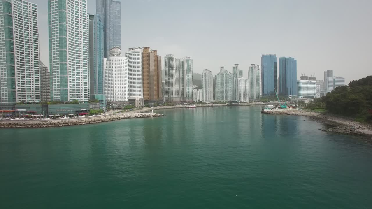 Aerial shot of Haeundae Marina with skyscrapers in South Korea