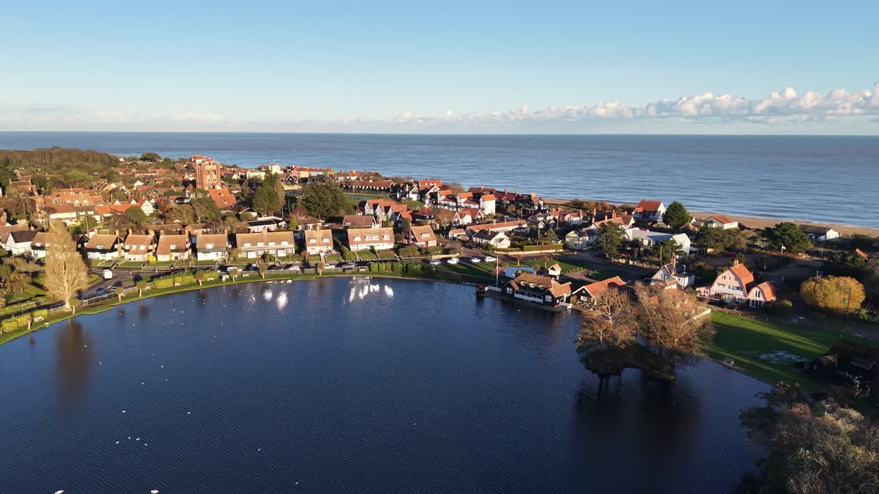 Thorpeness village the Mere Suffolk golden hour aerial drone 4K footage