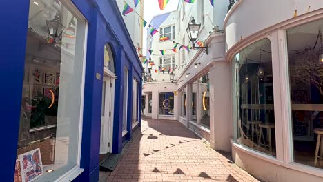 a vibrant alley with colorful shops