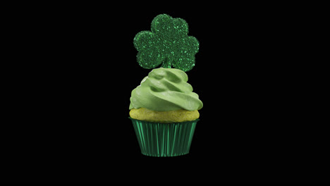 Loop delicious and festively designed green cupcake with shamrock decoration for st patricks day