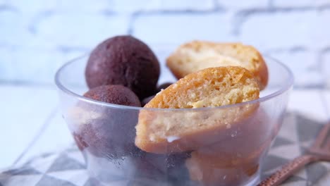 close up of indian sweet in a bowl on table.