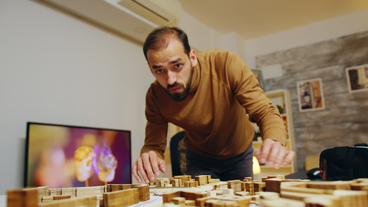 Creative architect in his home office working on a big project