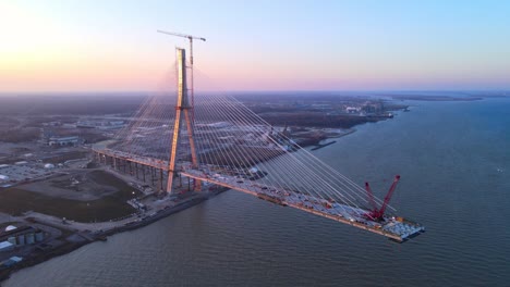 Revealing-shot-of-Howe-International-Bridge-at-Sunset