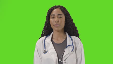 Portrait-Of-Female-Doctor-In-White-Lab-Coat-With-Stethoscope-Against-Green-Screen