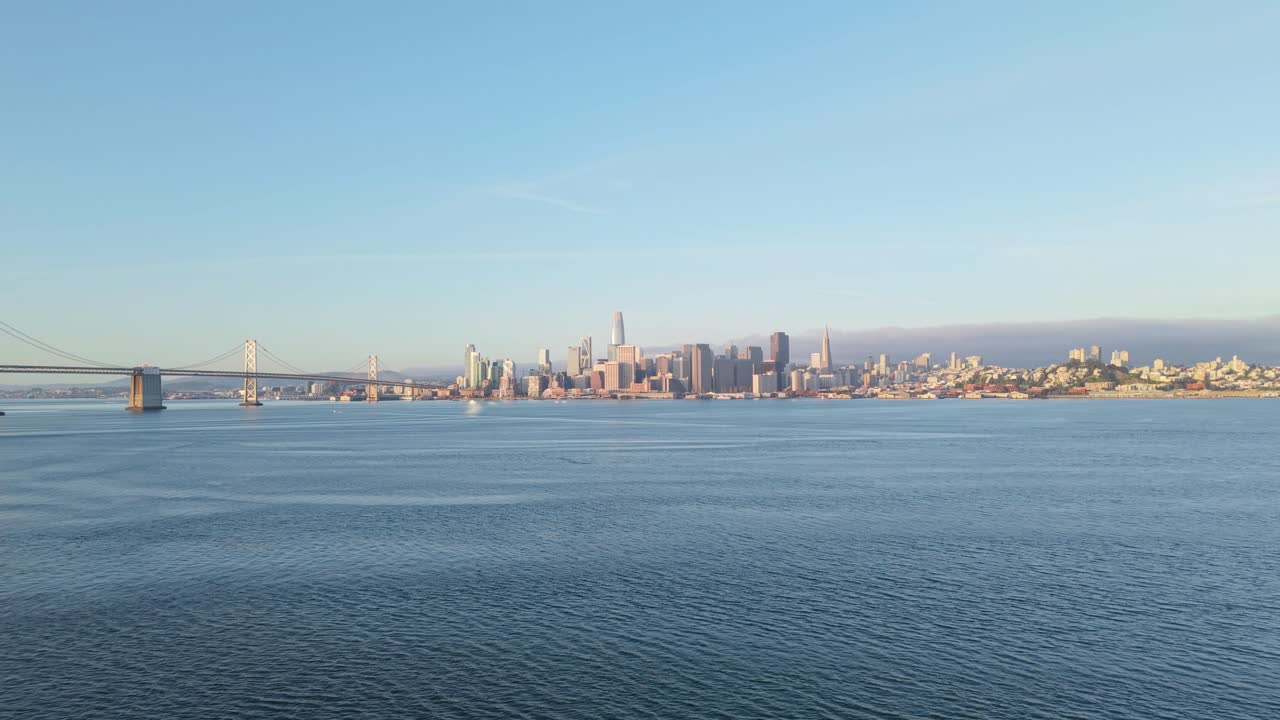 A tranquil aerial view showcases the urban character of San Francisco’s waterfront with layered architectural texture.