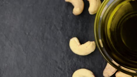 fresh made cashew oil on a rotating plate (seamless loopable)