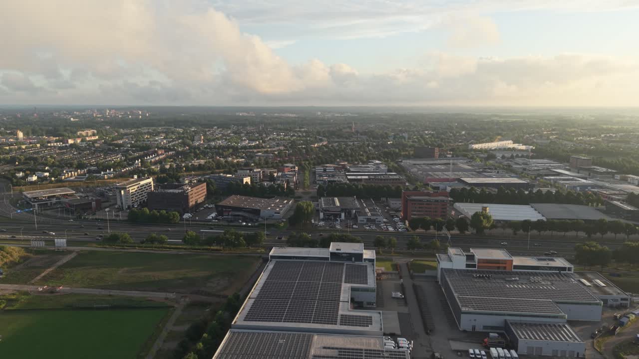 Drone flight over Amersfoort, the Netherlands, showing industrial zone, housing, and city skyline panorama